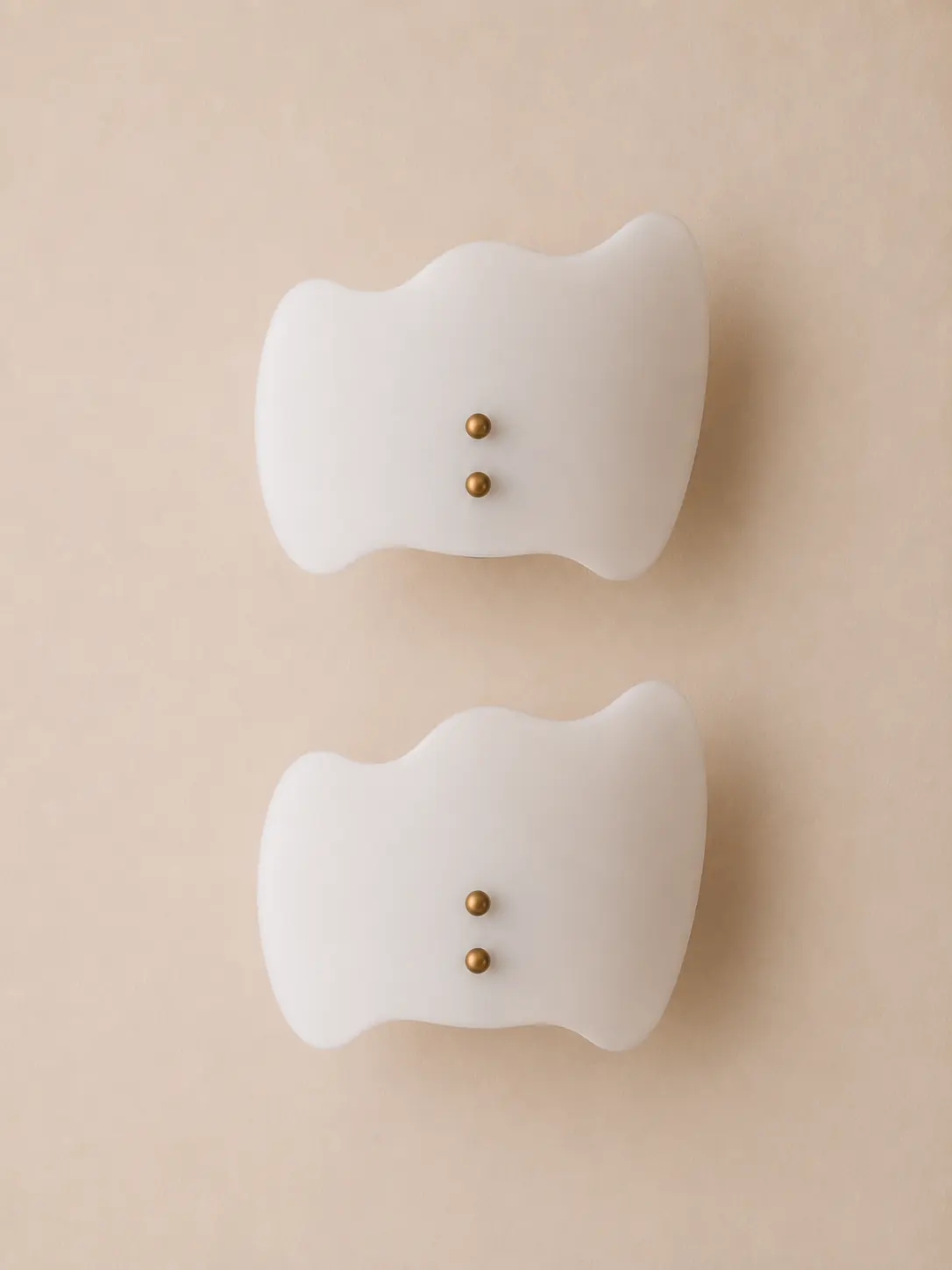 Vintage milk glass cloud wall sconces.